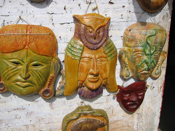Carved Mayan masks, Mazatlan