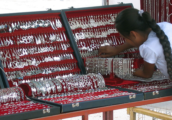 Silver jewelry merchant at a Oaxaca market