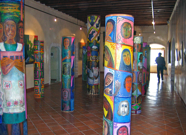 Pillars exhibit painted by Rodolfo Morales