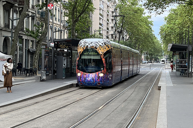 Colorful Tram at Place des Archives Station in Perrache District