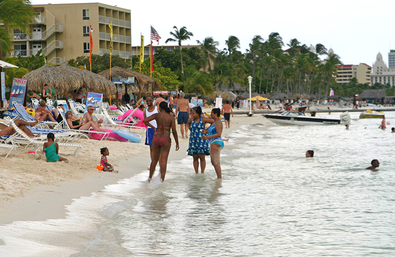 Get busy relaxing on Palm Beach, Aruba; (c) Soul Of America