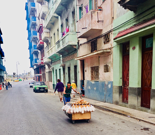 Havana street merchant pushing a cart; (c) Soul Of America