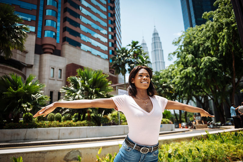 Portrait of African enjoying the city break in Kuala Lumpur City Center