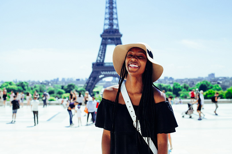 All smiles at Place du Trocadero in Paris with Eiffel Tower in the background